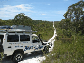 Beach trekkers North Stradbroke Island - C Tourism