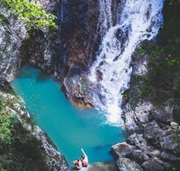 Explore Maleny Montville and take a swim under the waterfall. - C Tourism