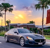 Maserati Quattroporte Limousine Transfer Cairns Airport to City - C Tourism