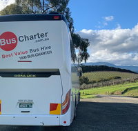 Private 13 Seat Mini Bus Brisbane CBD to a GC Theme Park Transfer - C Tourism