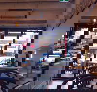 Holy Grounds - C Tourism