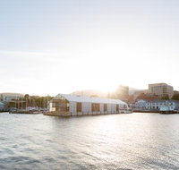 The Glass House - C Tourism