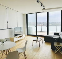 Modern Designer 2BR Apartment Near Airport  Beach - C Tourism