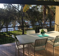 Reflections on the Murray river near Mandurah - C Tourism