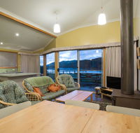 Arthur Riverfront and Sea Lodge downstream - C Tourism