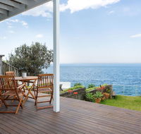 Unbelievable Clifftop Townhouse with Ocean Views - C Tourism