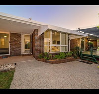 Woorim Secluded Palms Cottage - C Tourism