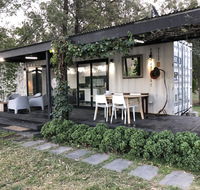Absolute riverfront shipping container cabin - C Tourism
