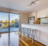 At the Beach - C Tourism